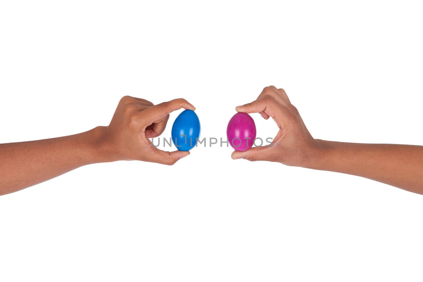 Hand holding colorful Easter eggs