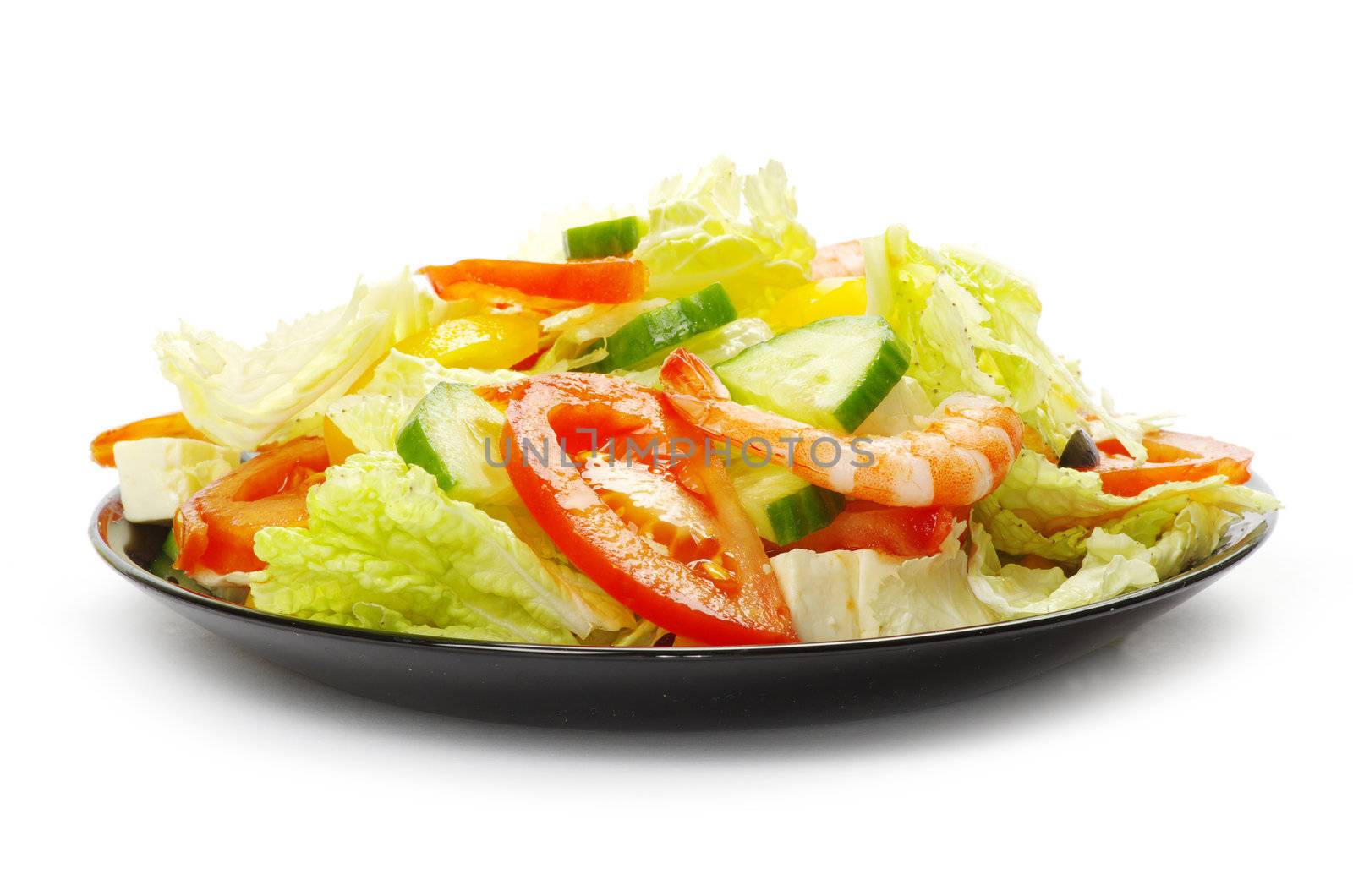 vegetable salad in plate on white