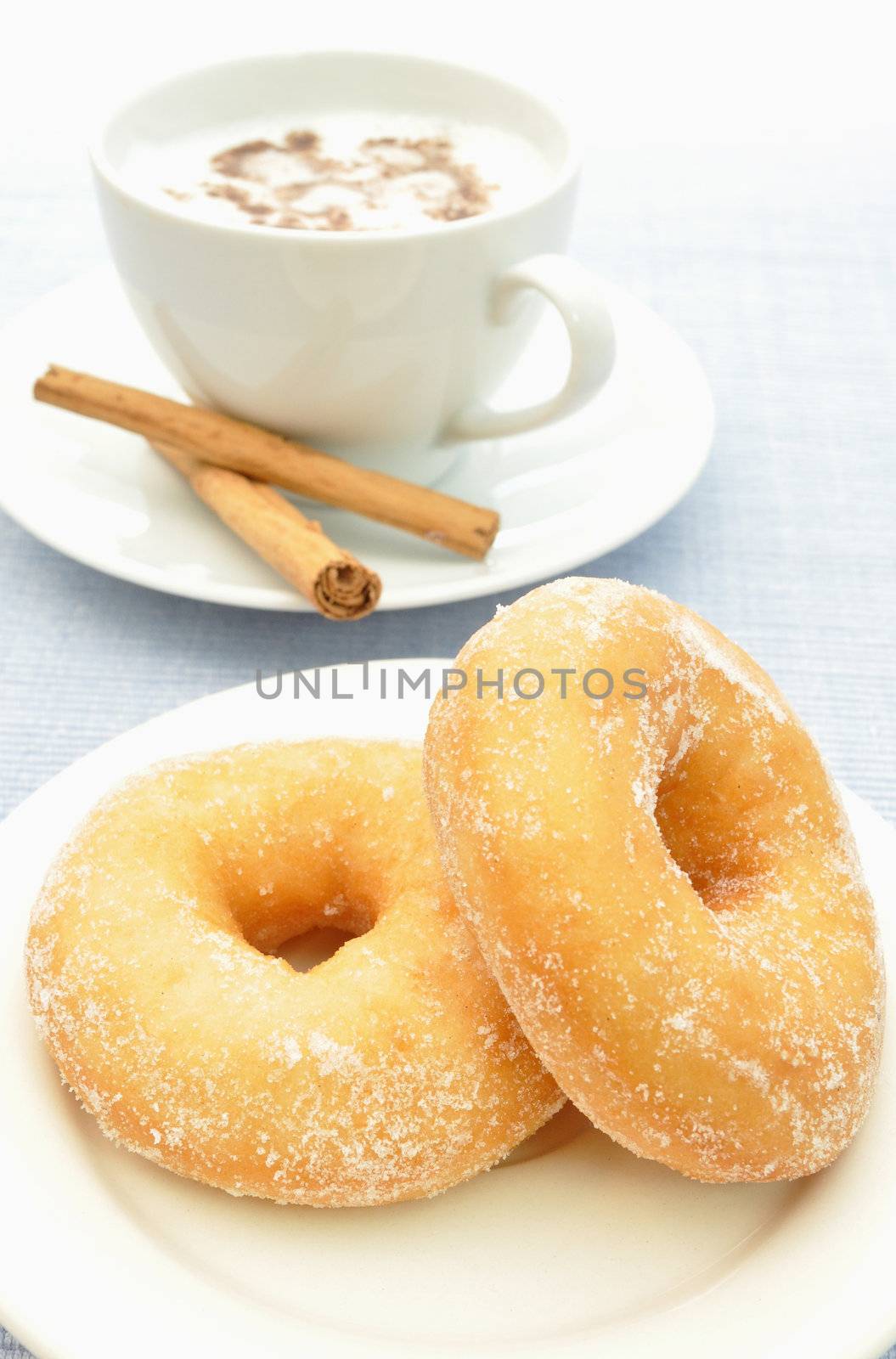 Donuts and coffee by unikpix
