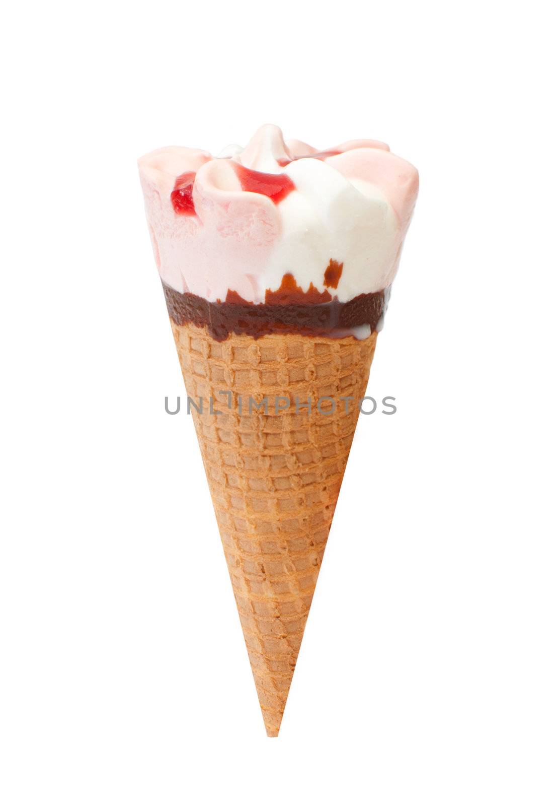 Strawberry, vanilla and chocolate icecream in a cone