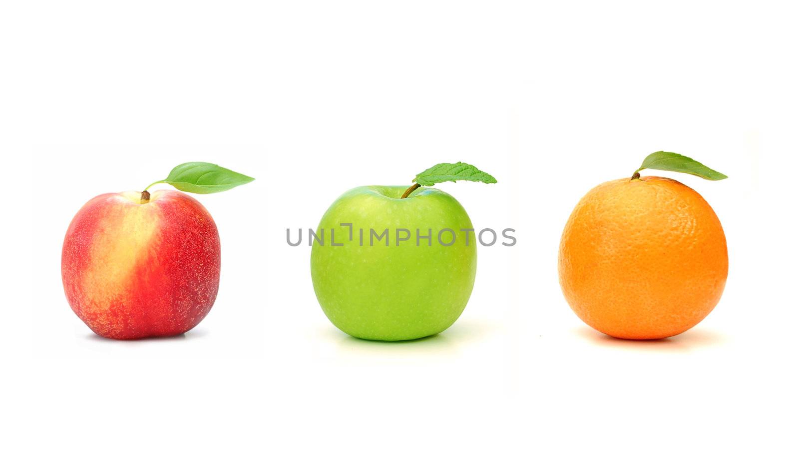 Ripe orange, apple and peach isolated on a white background