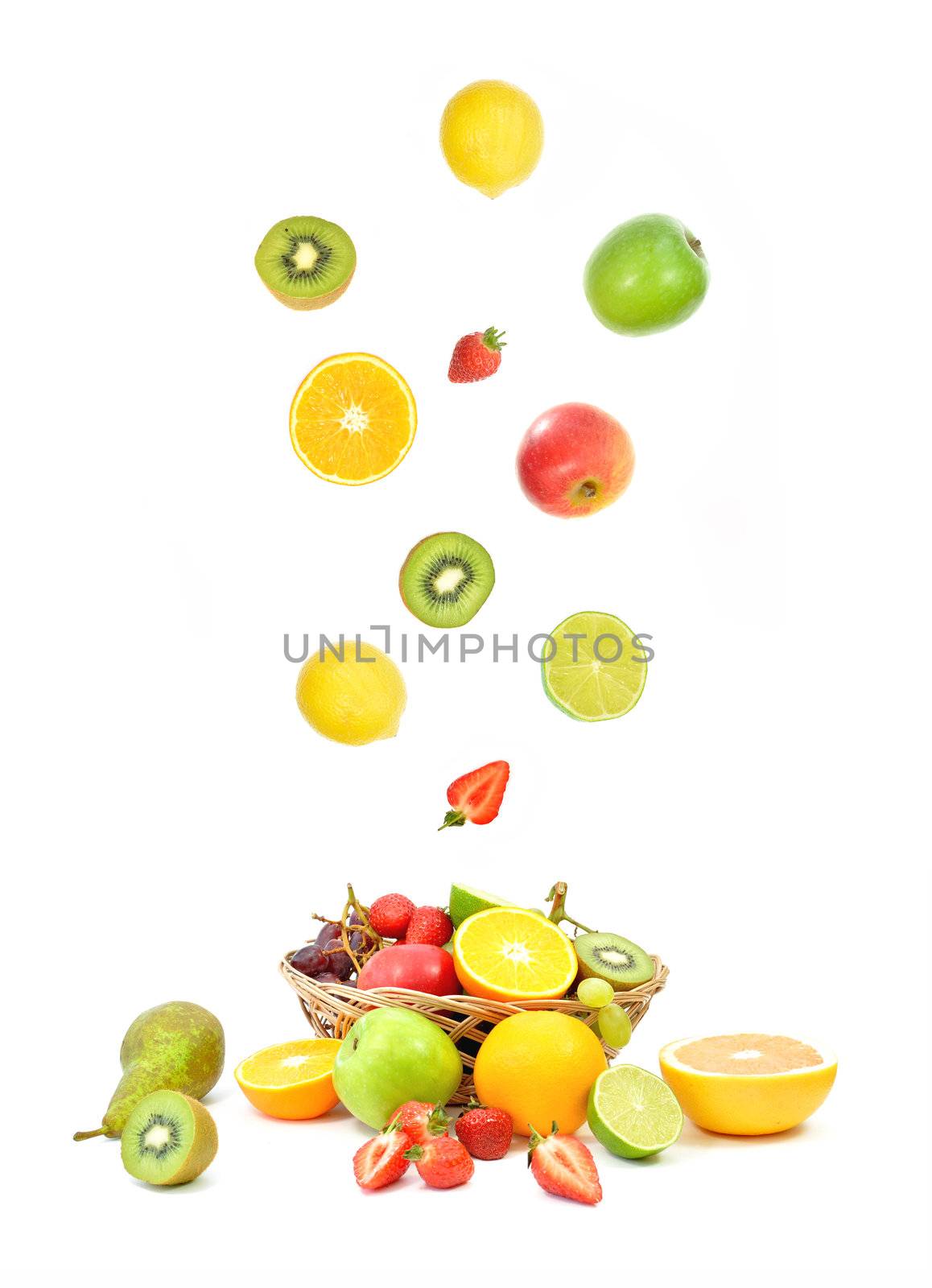 Array fruits falling into a basket 