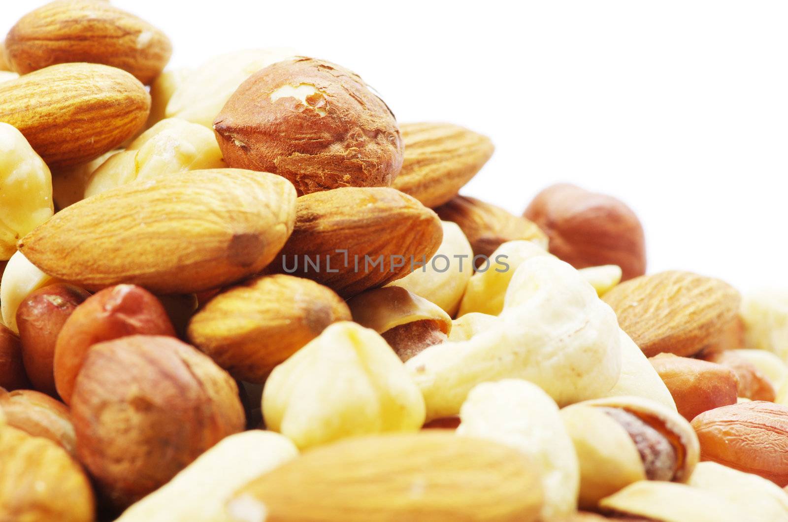 Assorted mixed nuts on white background