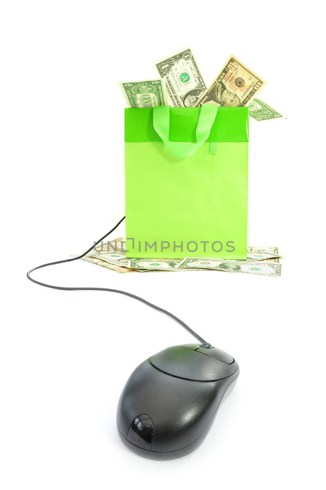 Gift bag packed with banknotes attached to a computer mouse 