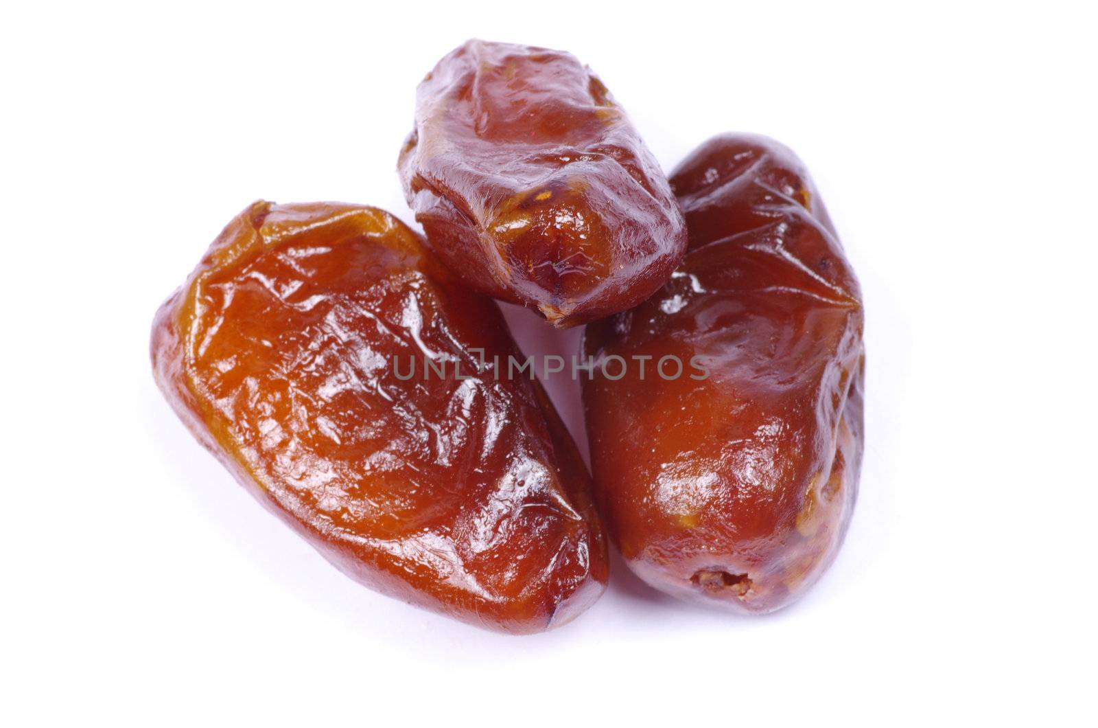 dryed dates on white background