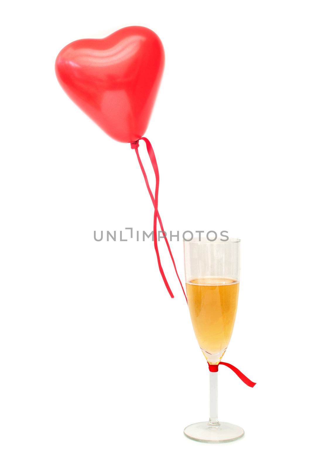 Helium air balloon tied to a glass of champagne over a white background