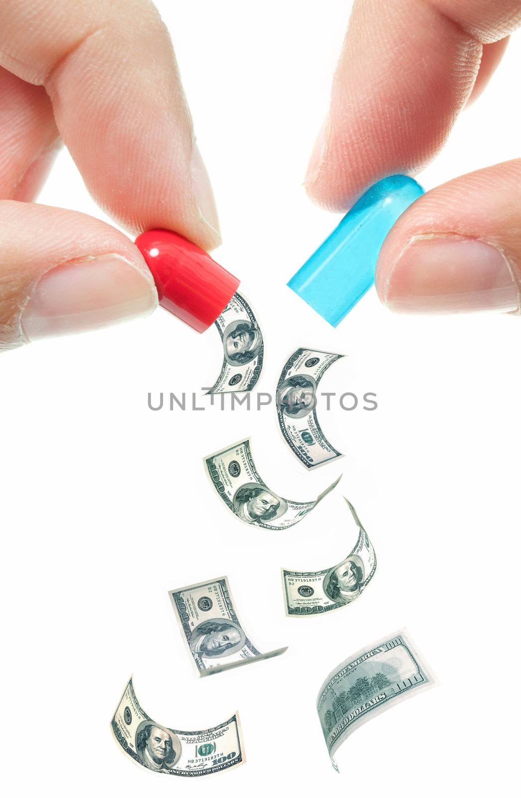 Dollar notes falling from an open pill 
