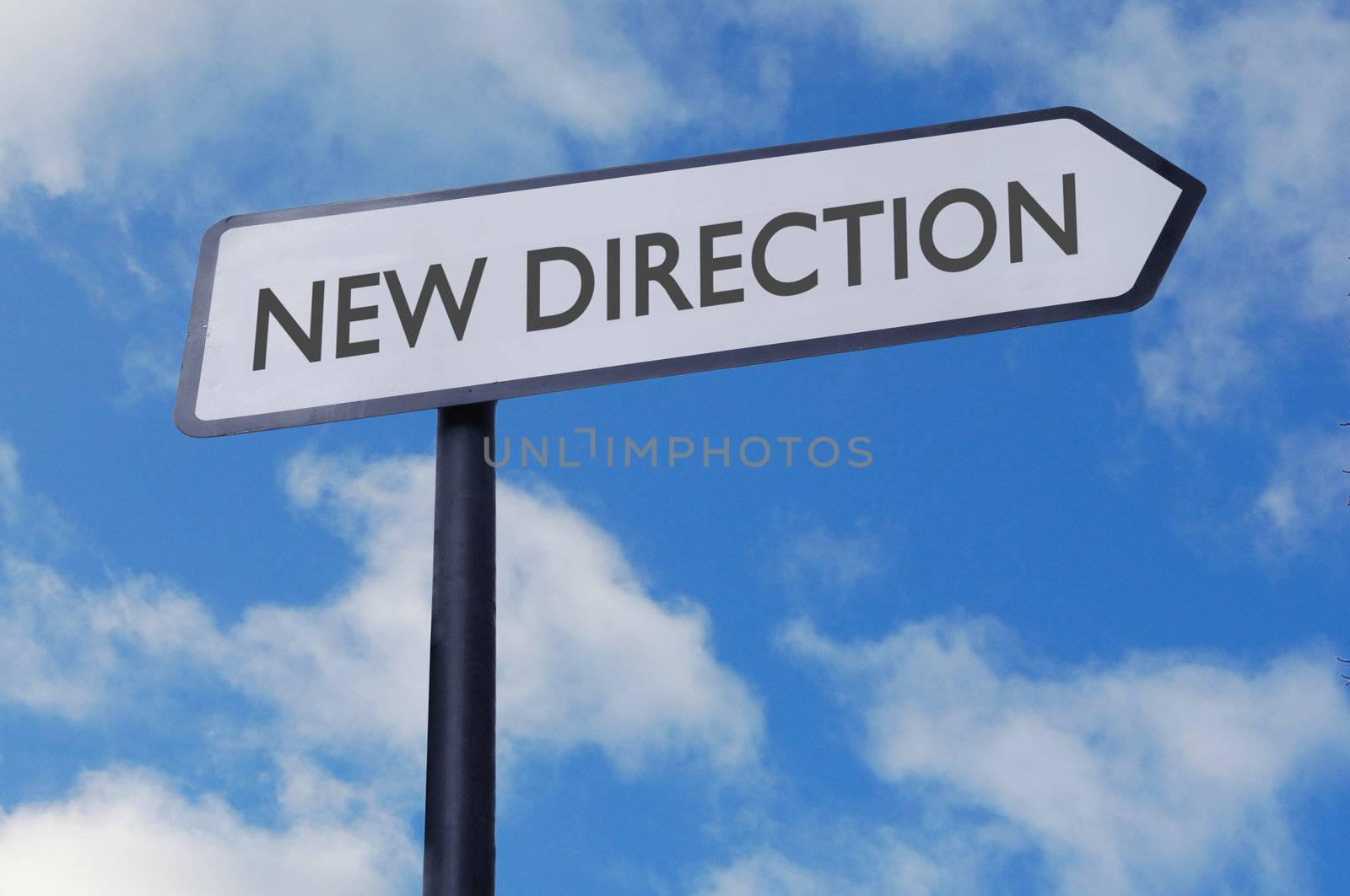 New direction street sign against blue sky