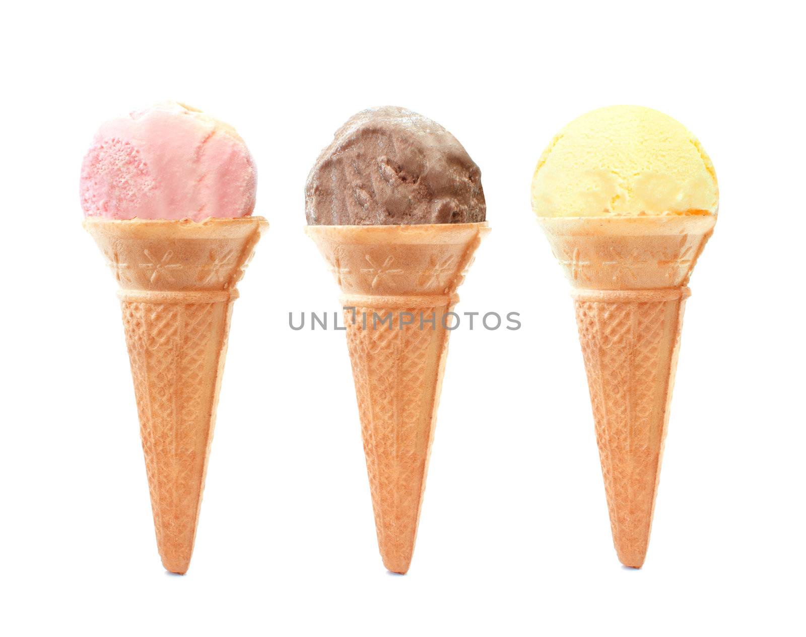 Strawberry,vanilla and chocolate icecream cones isolated over a white background