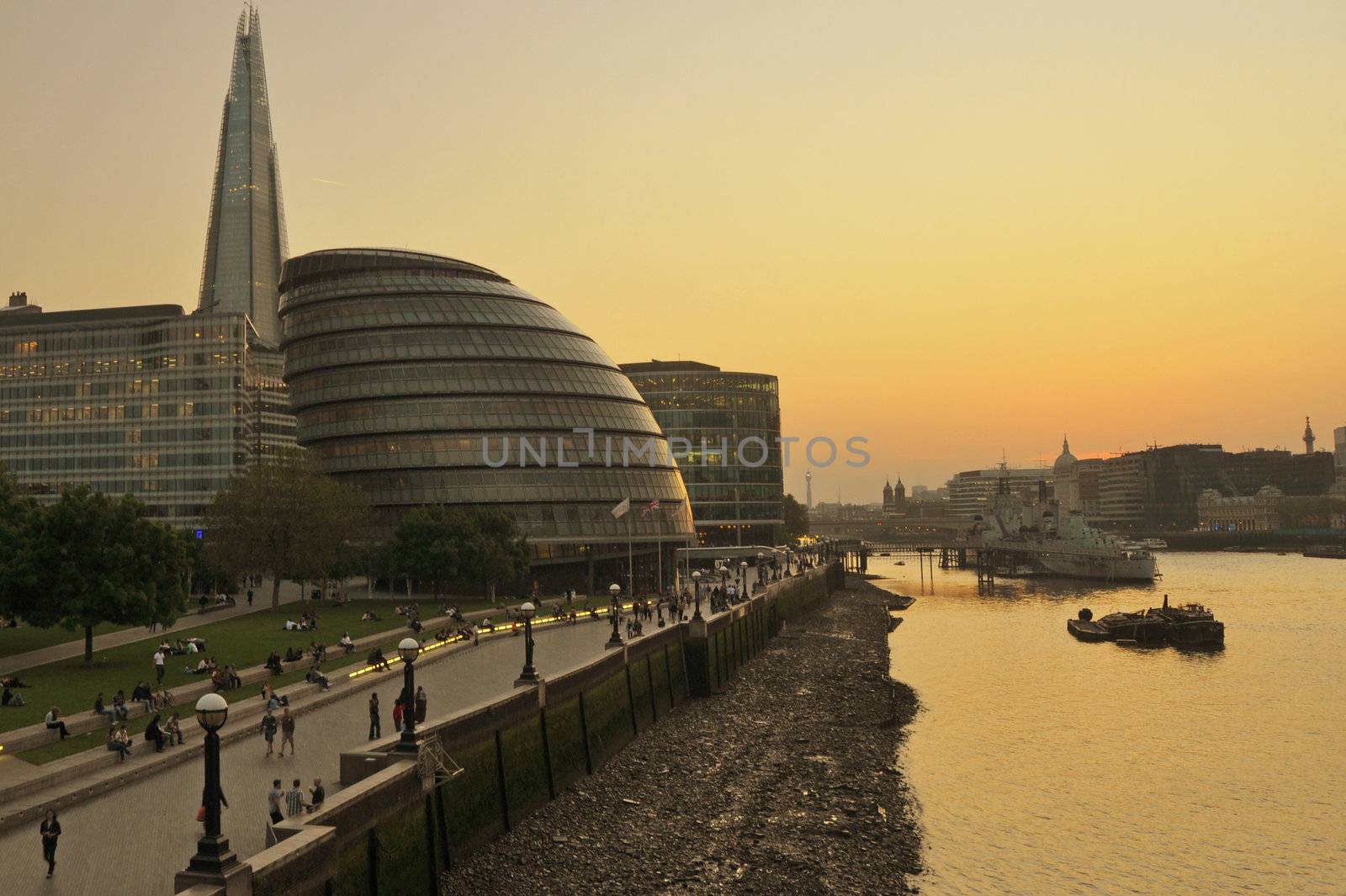 London City Hall, the Shard and surrounding buildings along the River Thames at sunset