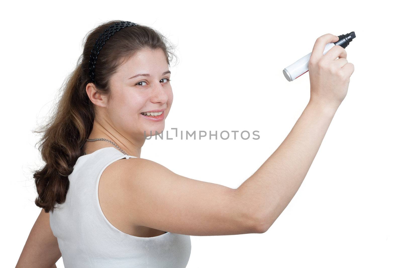 young brunette woman is writing with a marker