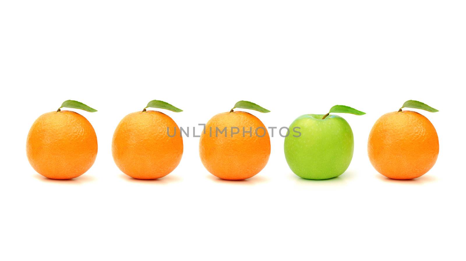 Green apple stands out in a line of oranges