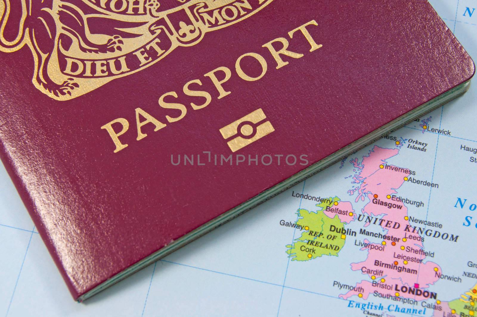 Closeup of a british passport on a map
