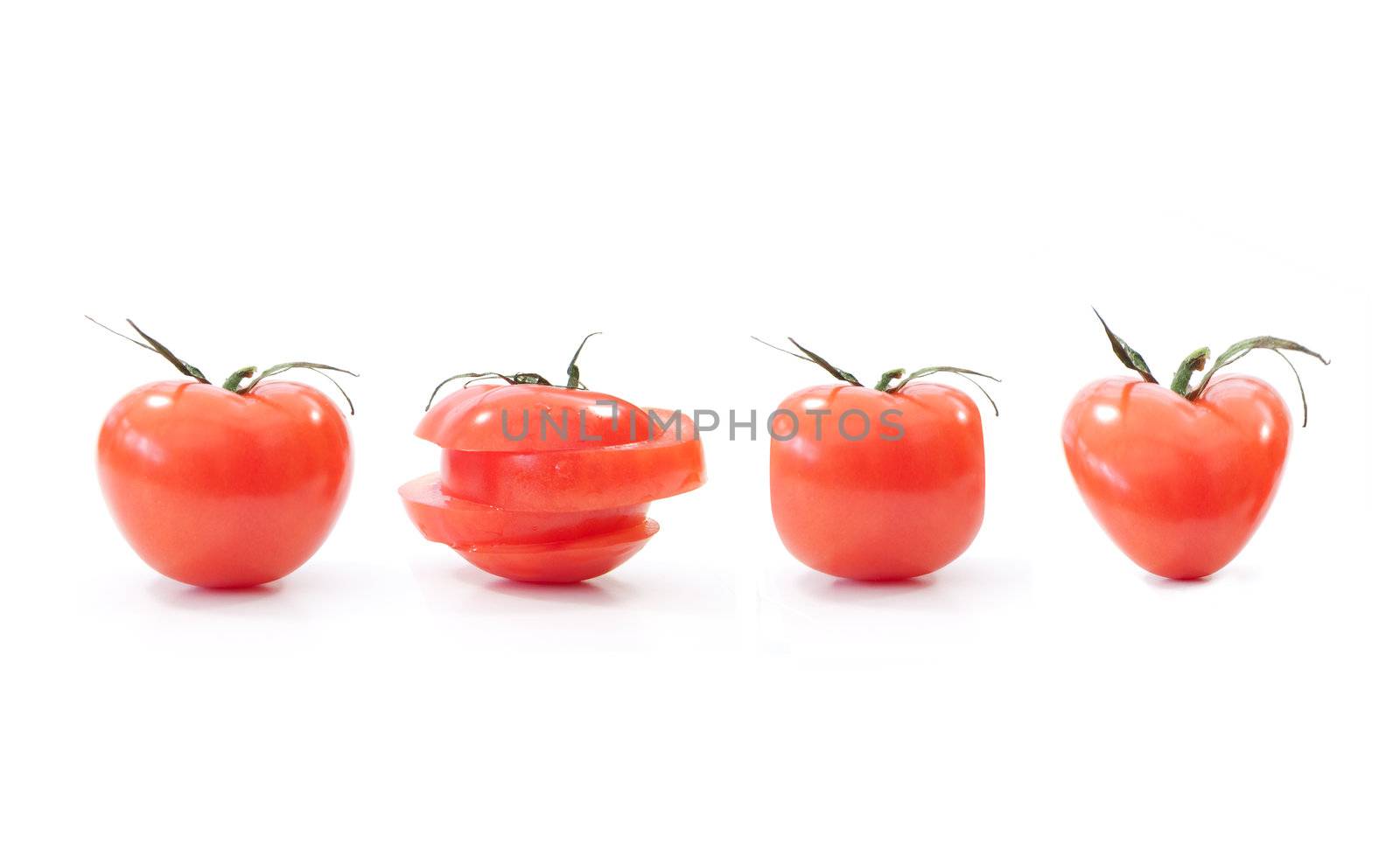 Different types of tomato including square, heart, and slices 