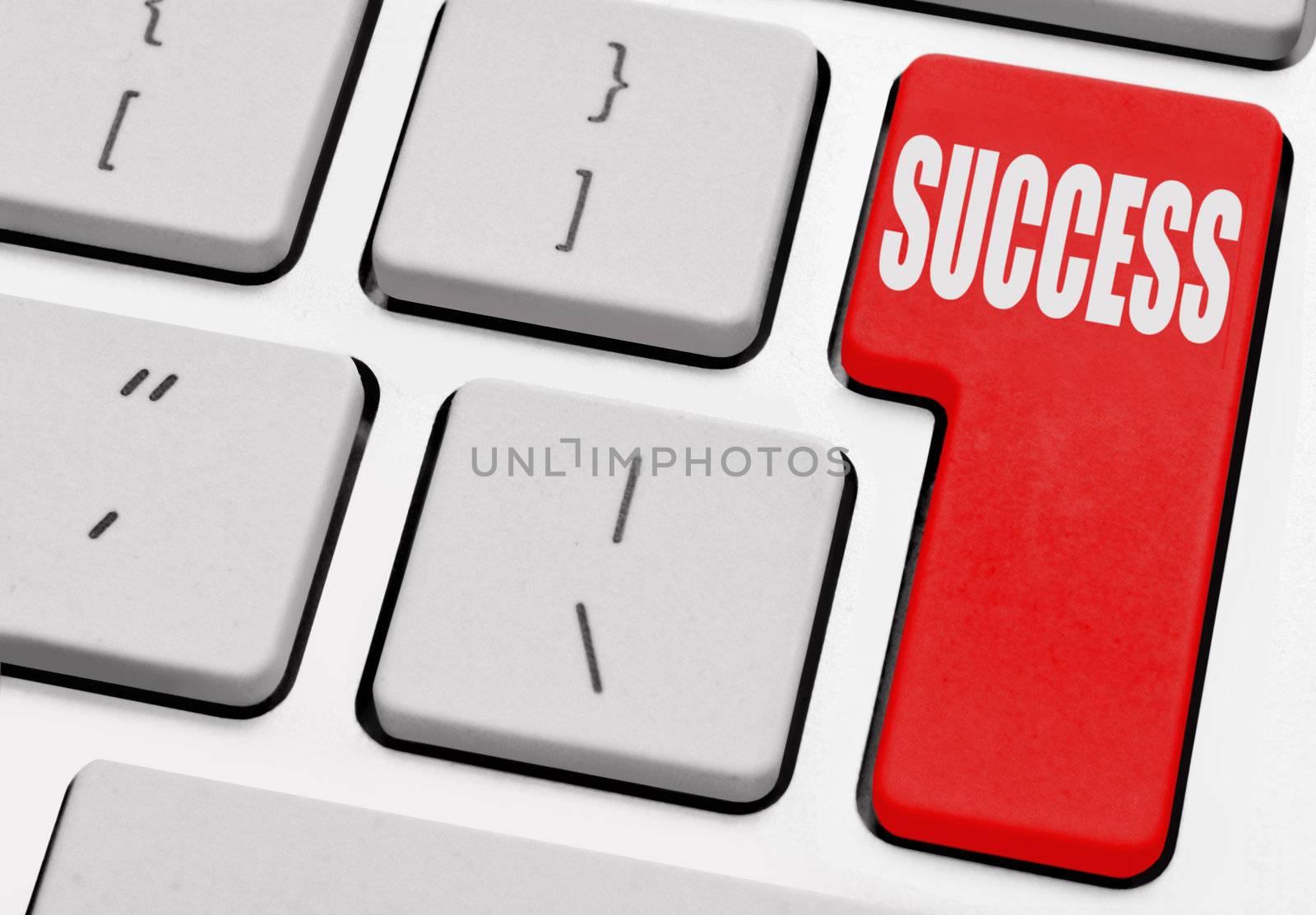 Success marked on a computer return key