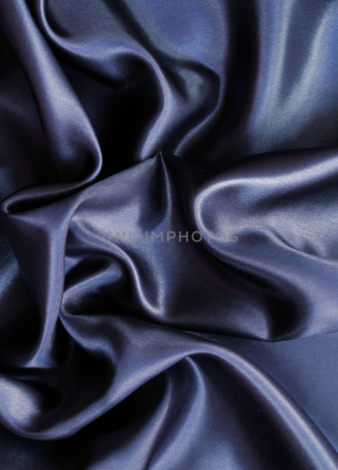 Smooth elegant black silk as background by oxanatravel