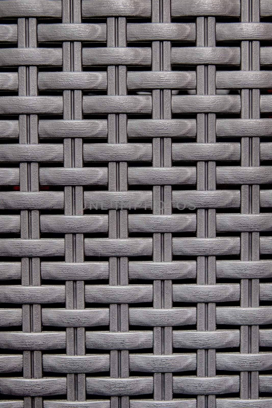 Black wooden striped textured basket weaving background. 