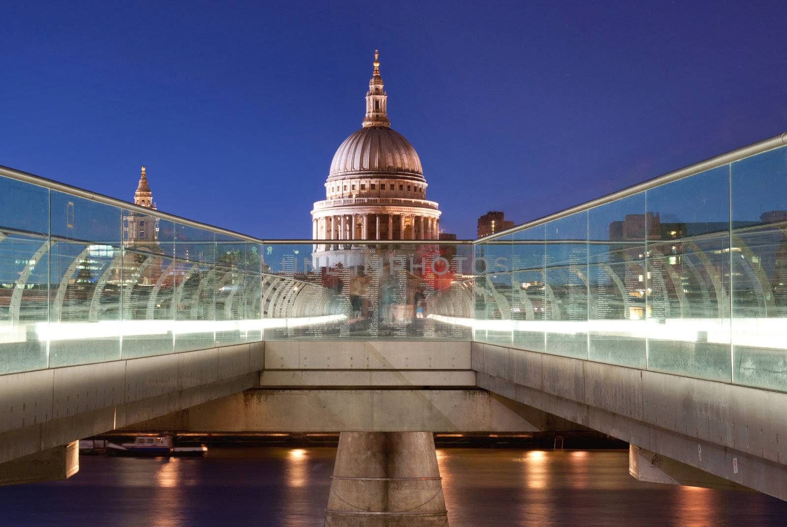 View of St Paul's and the Millennium Bridge at night 
