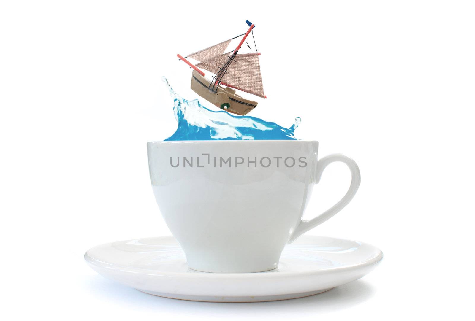 Sailing boat crashing against a wave inside a teacup