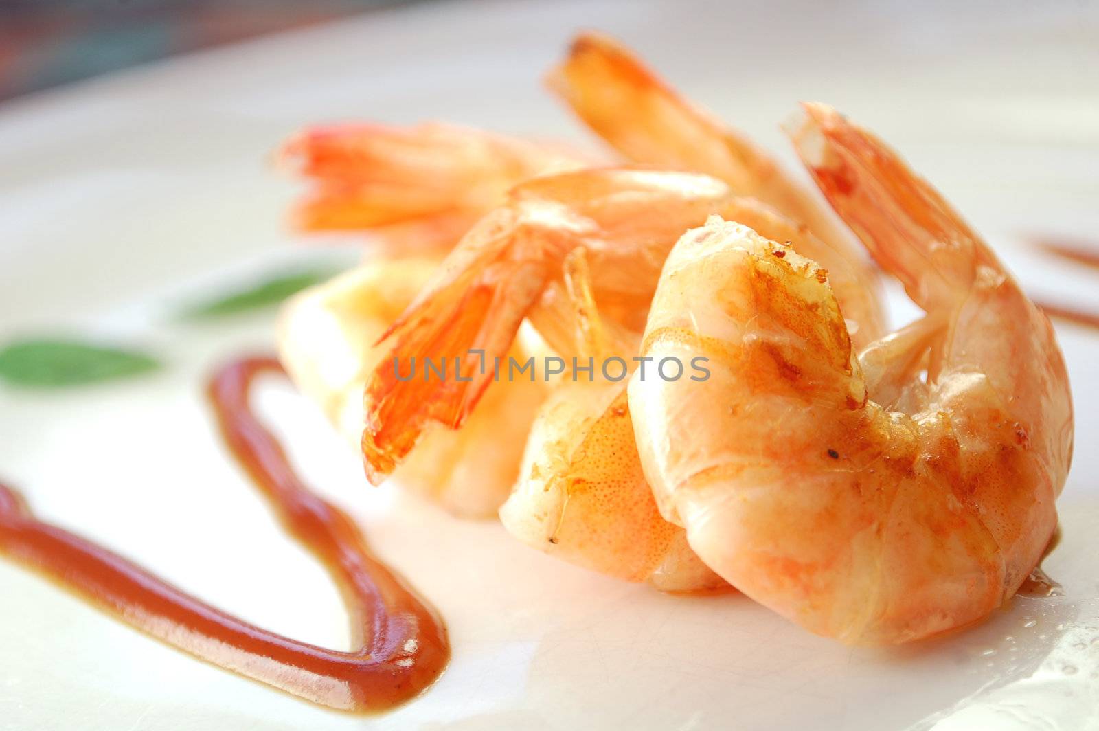 Succulent tiger prawns with gourmet sauce 