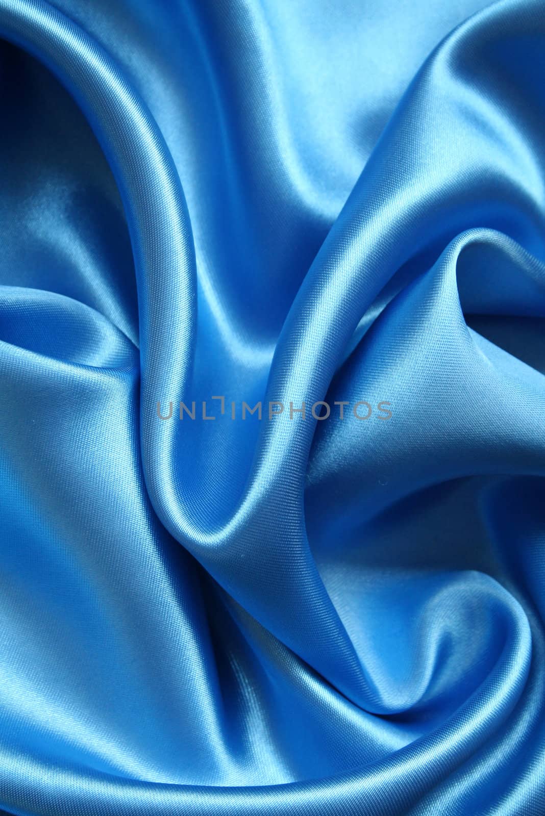 Smooth elegant dark blue silk can use as background 