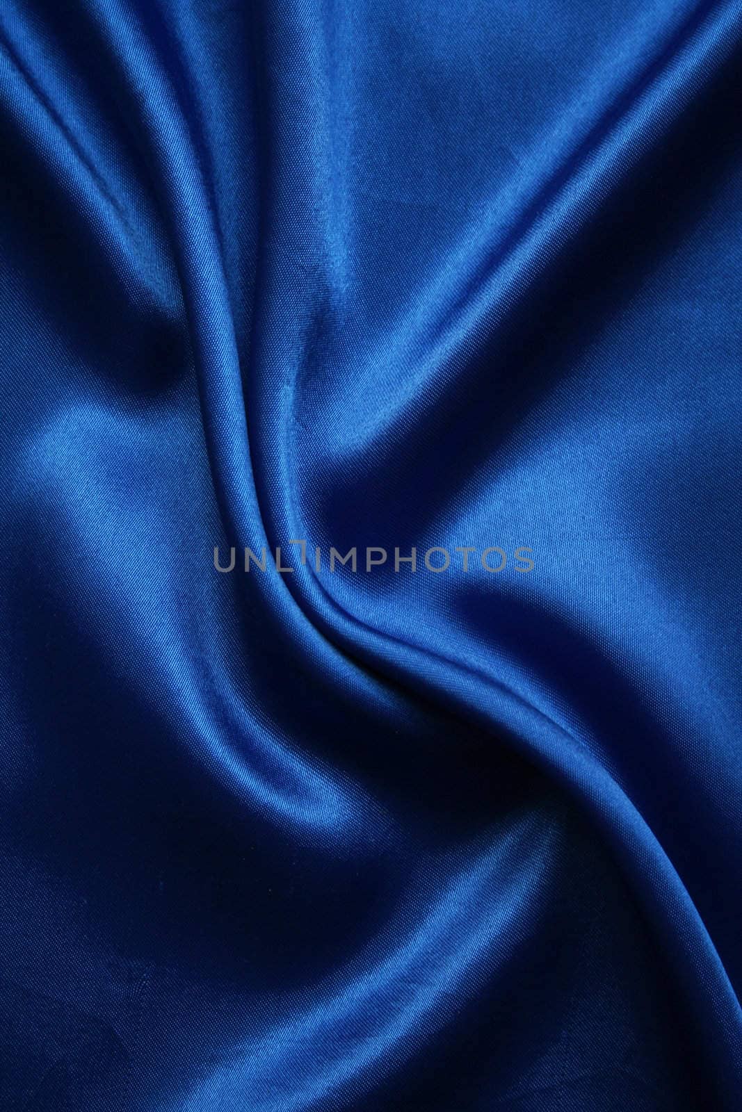 Smooth elegant dark blue silk can use as background 
