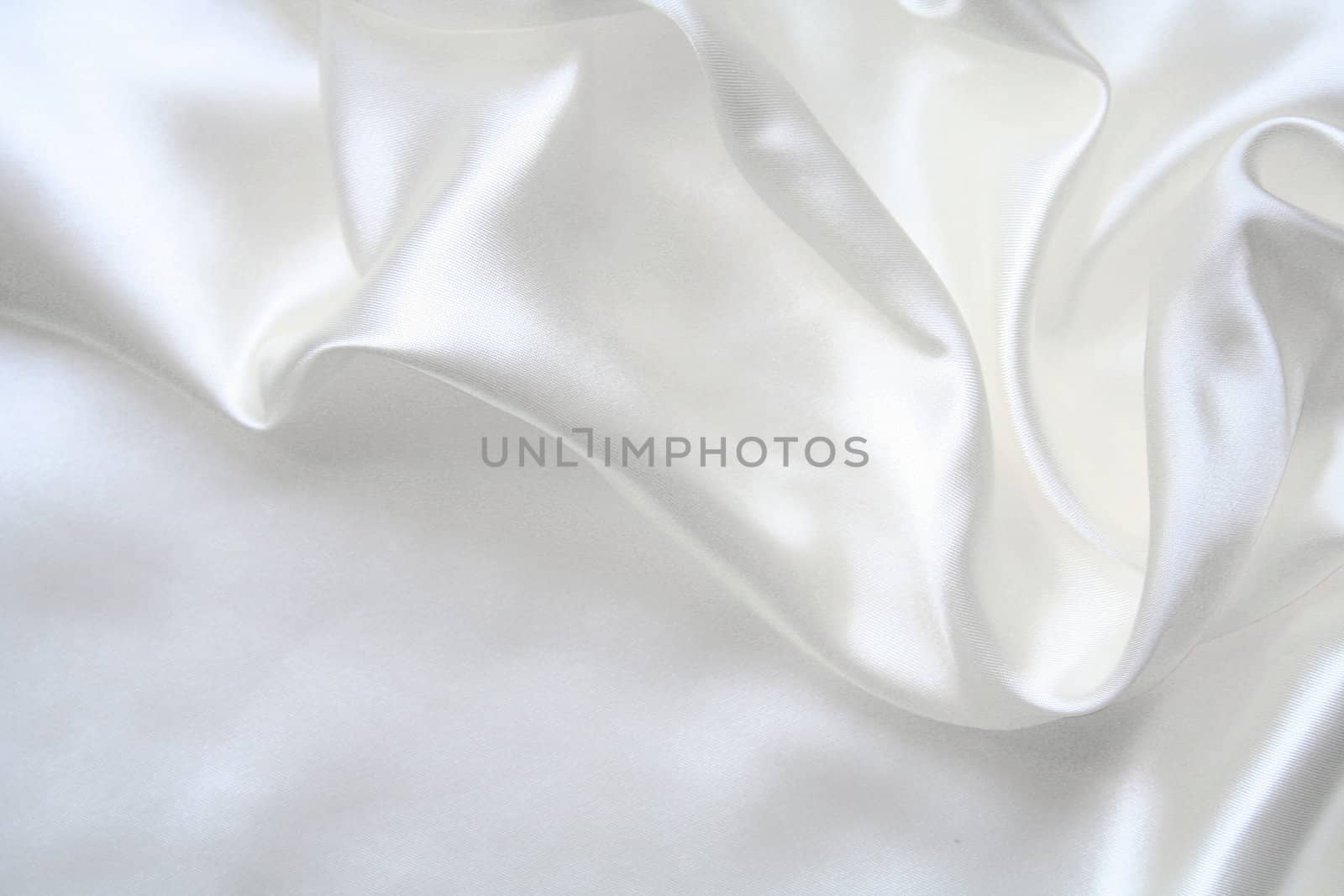 Smooth elegant white silk can use as wedding background 