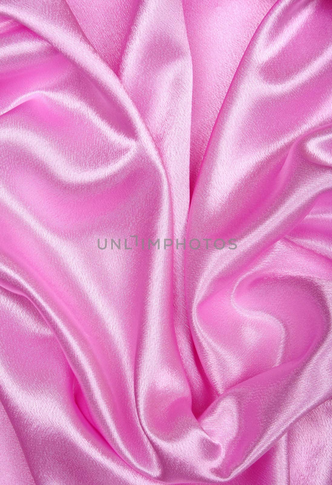 Smooth elegant pink silk as background 