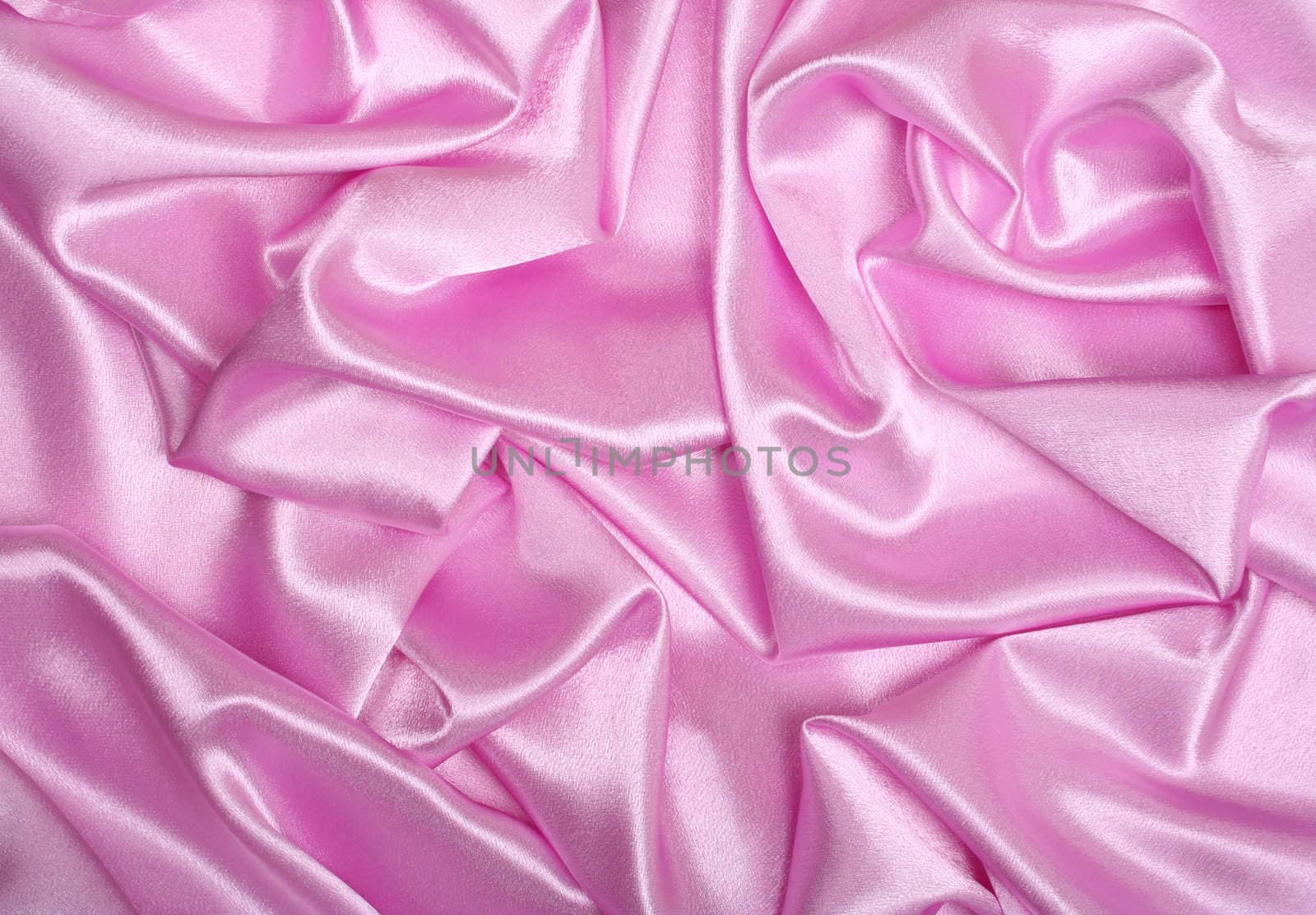 Smooth elegant pink silk as background 