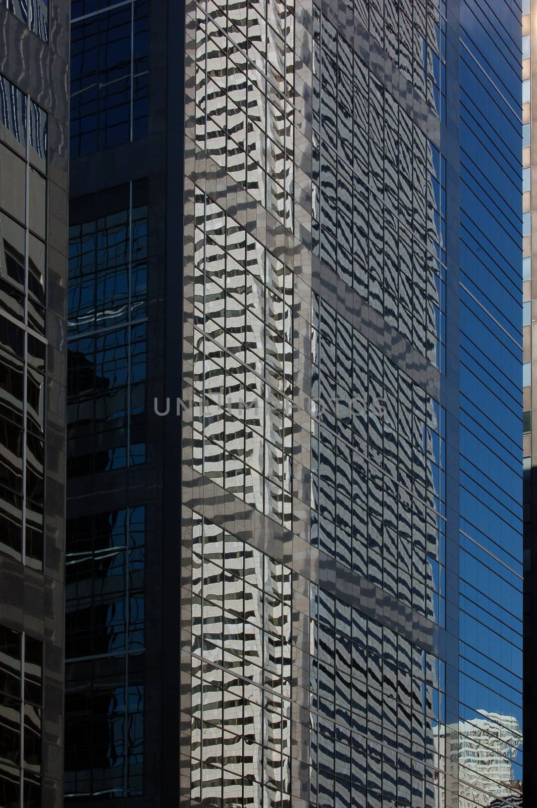 reflection in a glass wall of a high-rise building