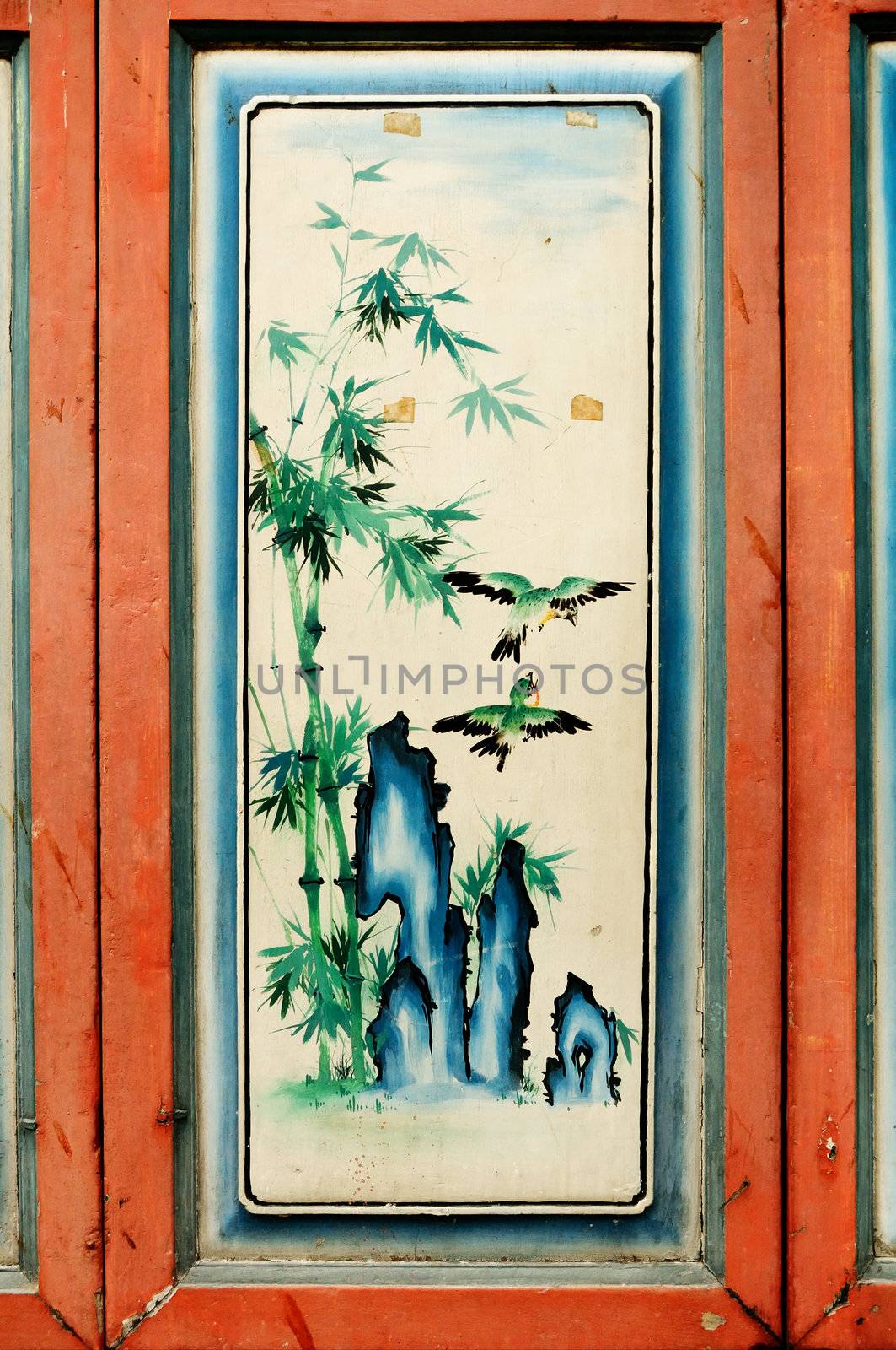 Antique Chinese art painting on wood wall of chinese temple