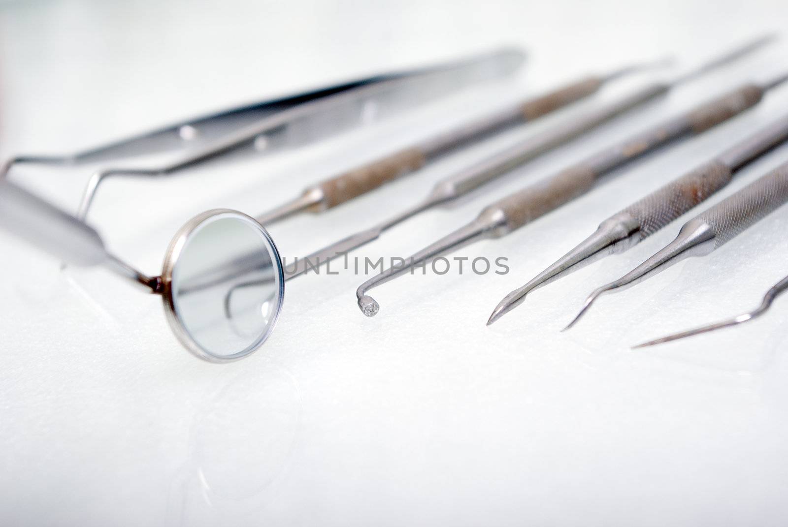 close up dental instruments 
      
.shallow DOF