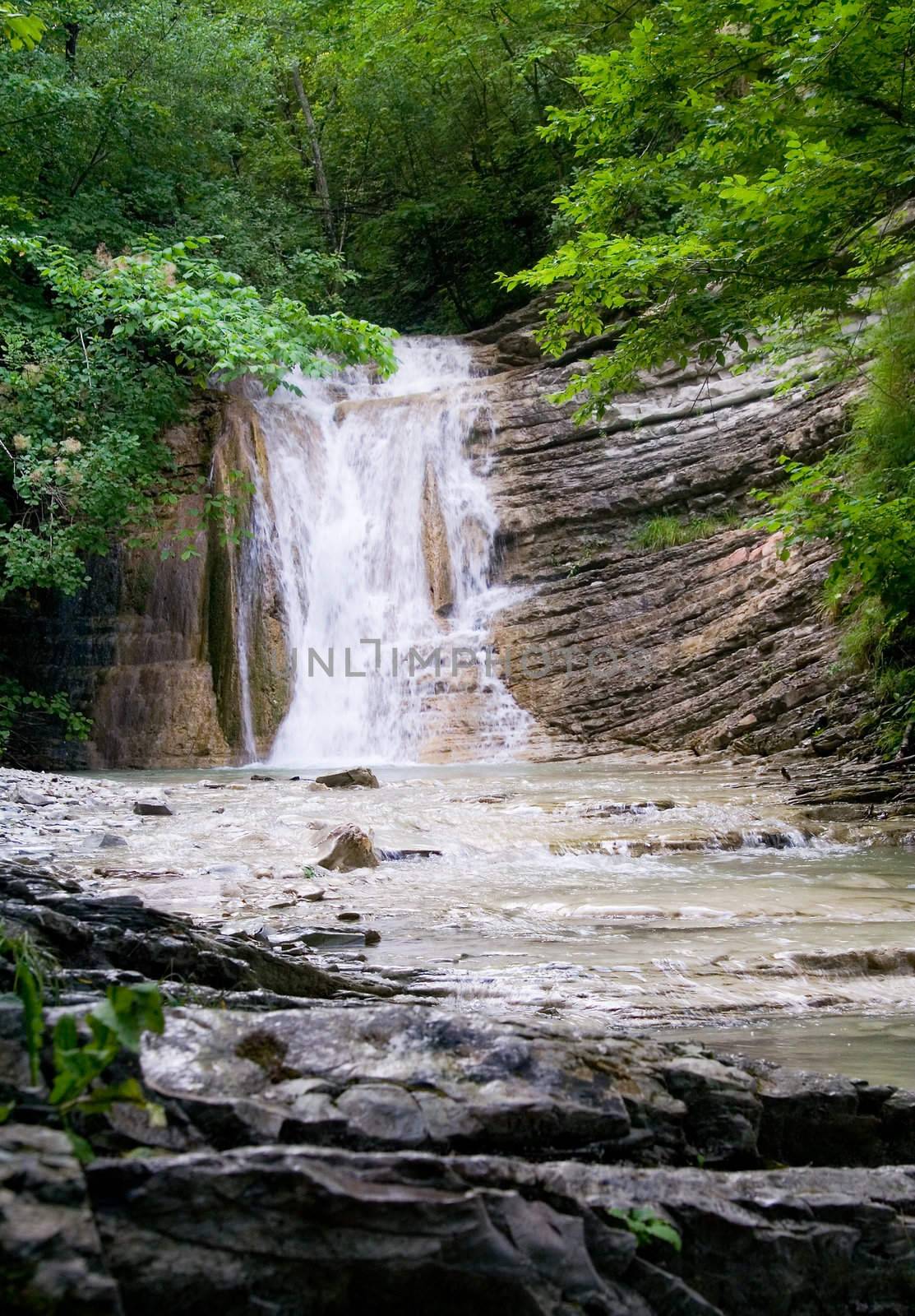 northern caucasian waterfall on a summers day