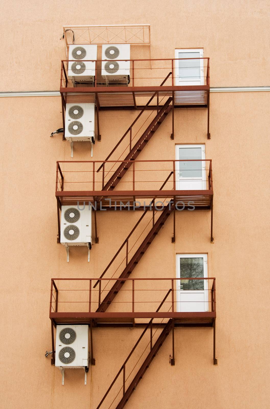 External air-conditioner units mounted outside on a wall