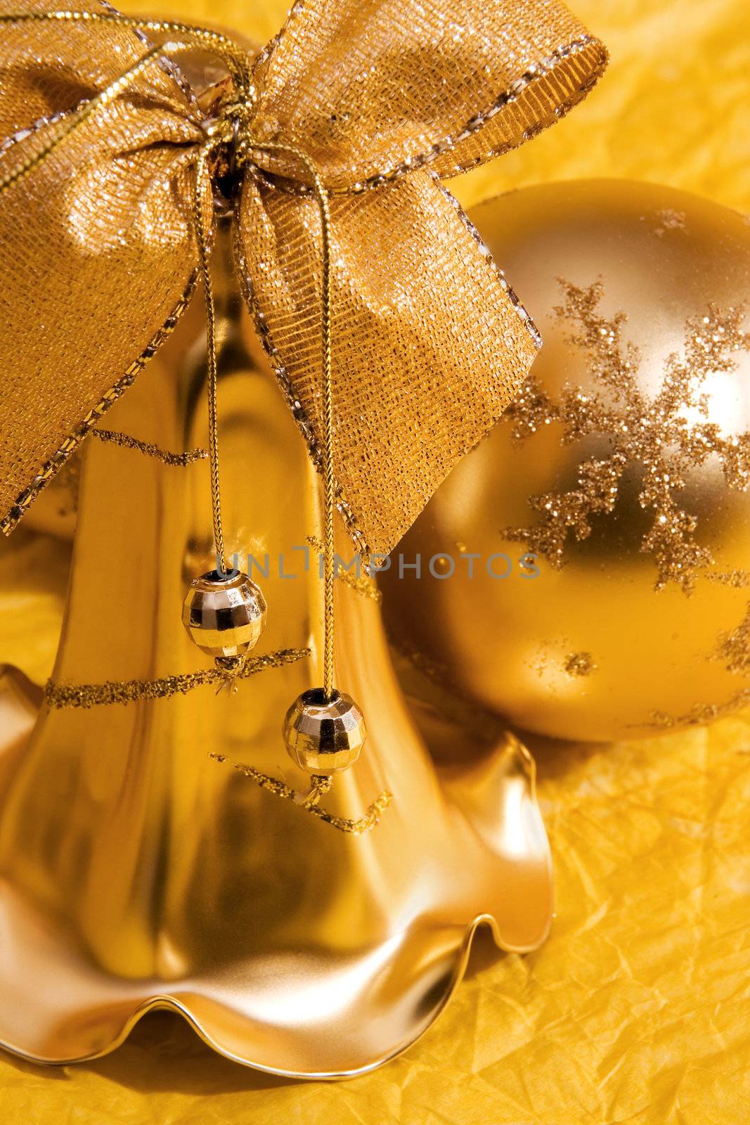 The Golden Christmas bell and ball. Close-up