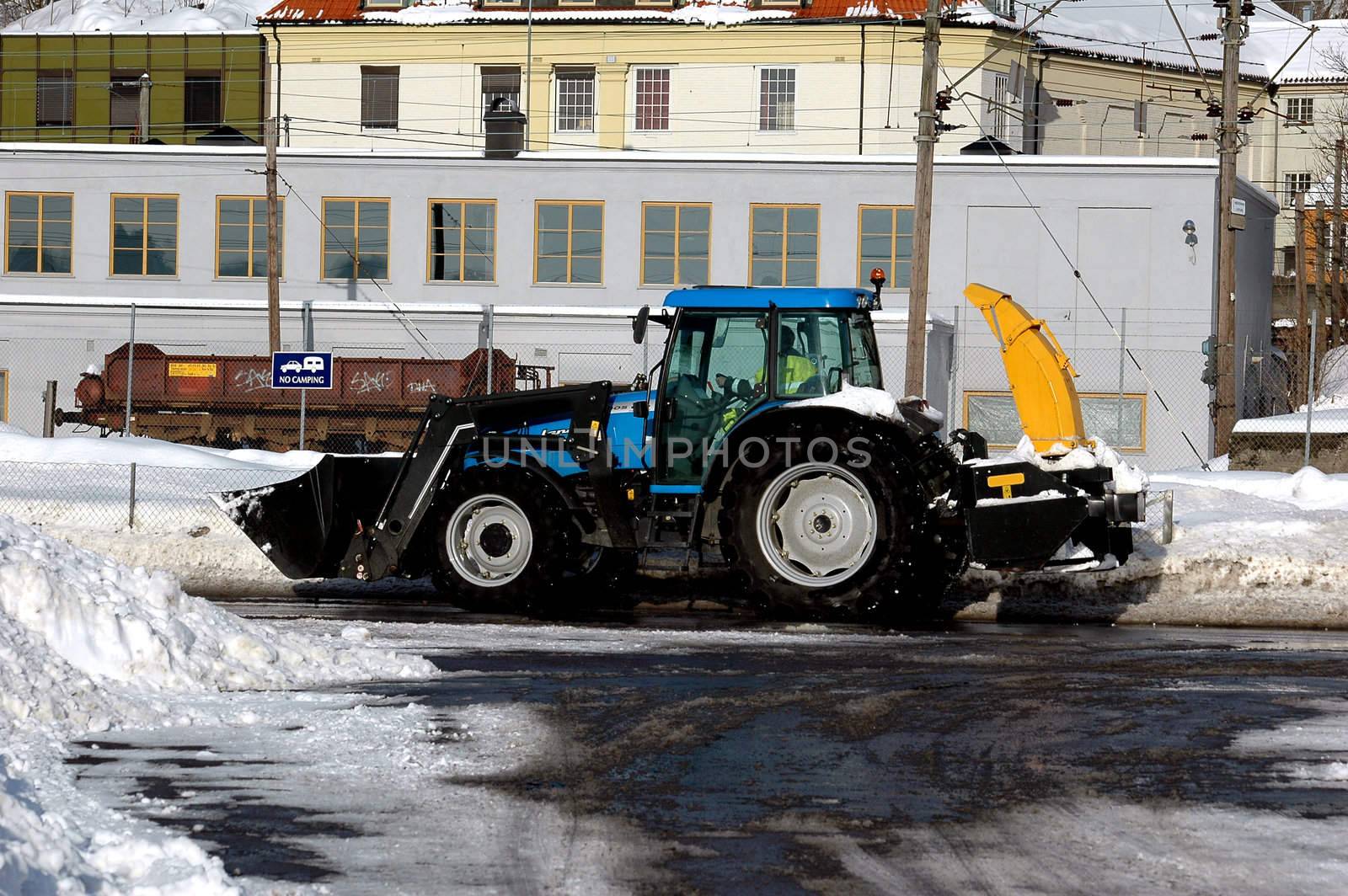 Driving snow away. Norwegian winter.
Larvik, Vestfold, Norway. - 2006.