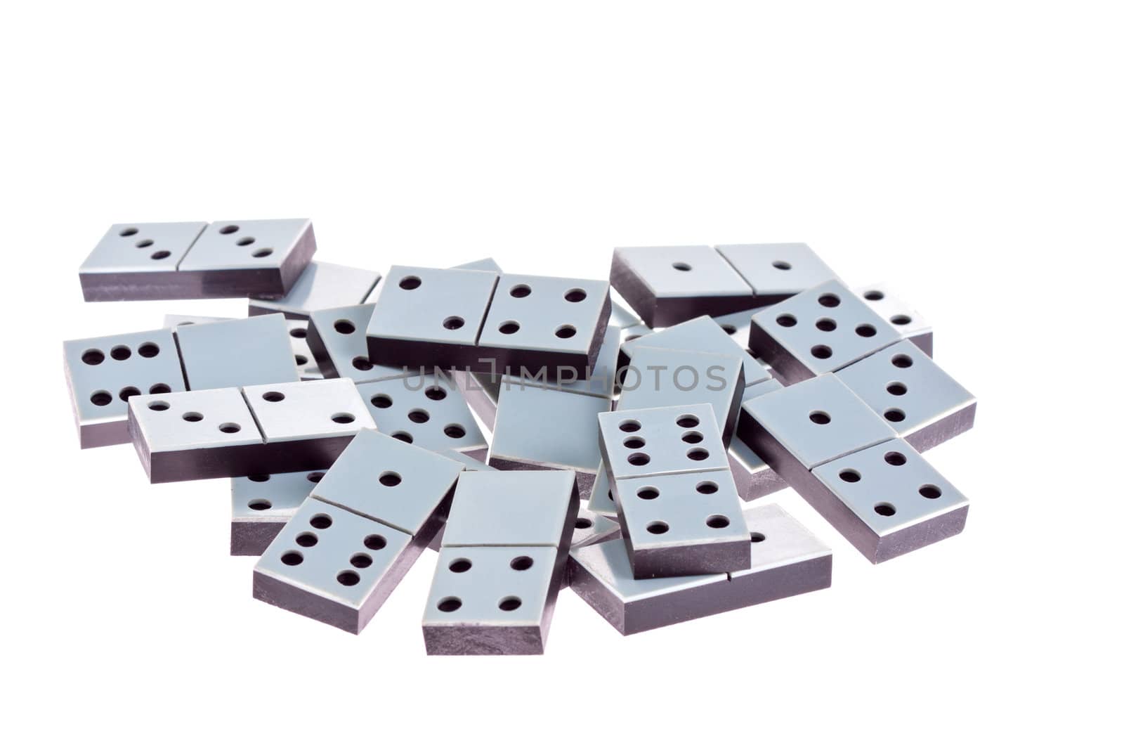 White dominoes lying flat on a white background.