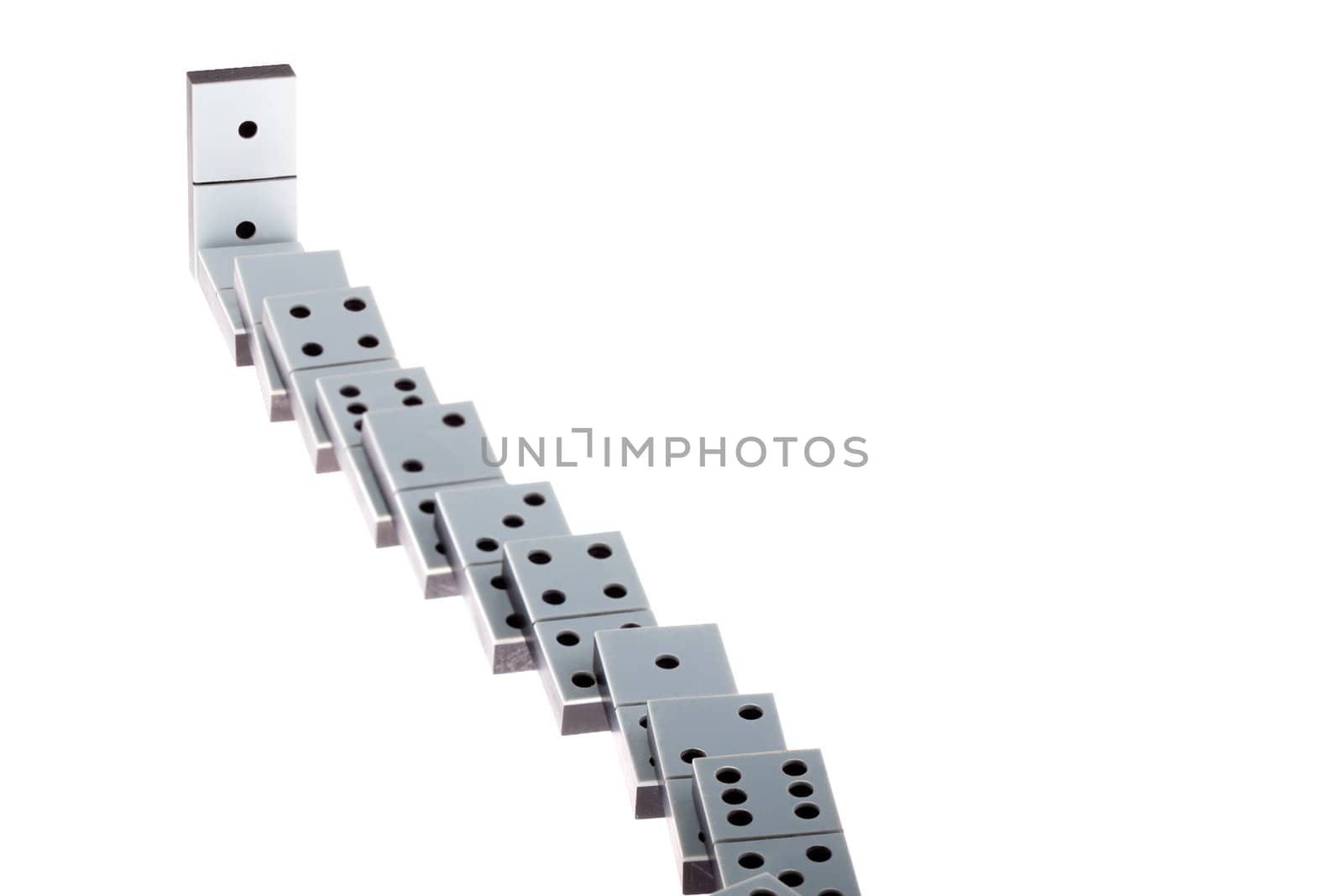 White dominoes lying flat on a white background.