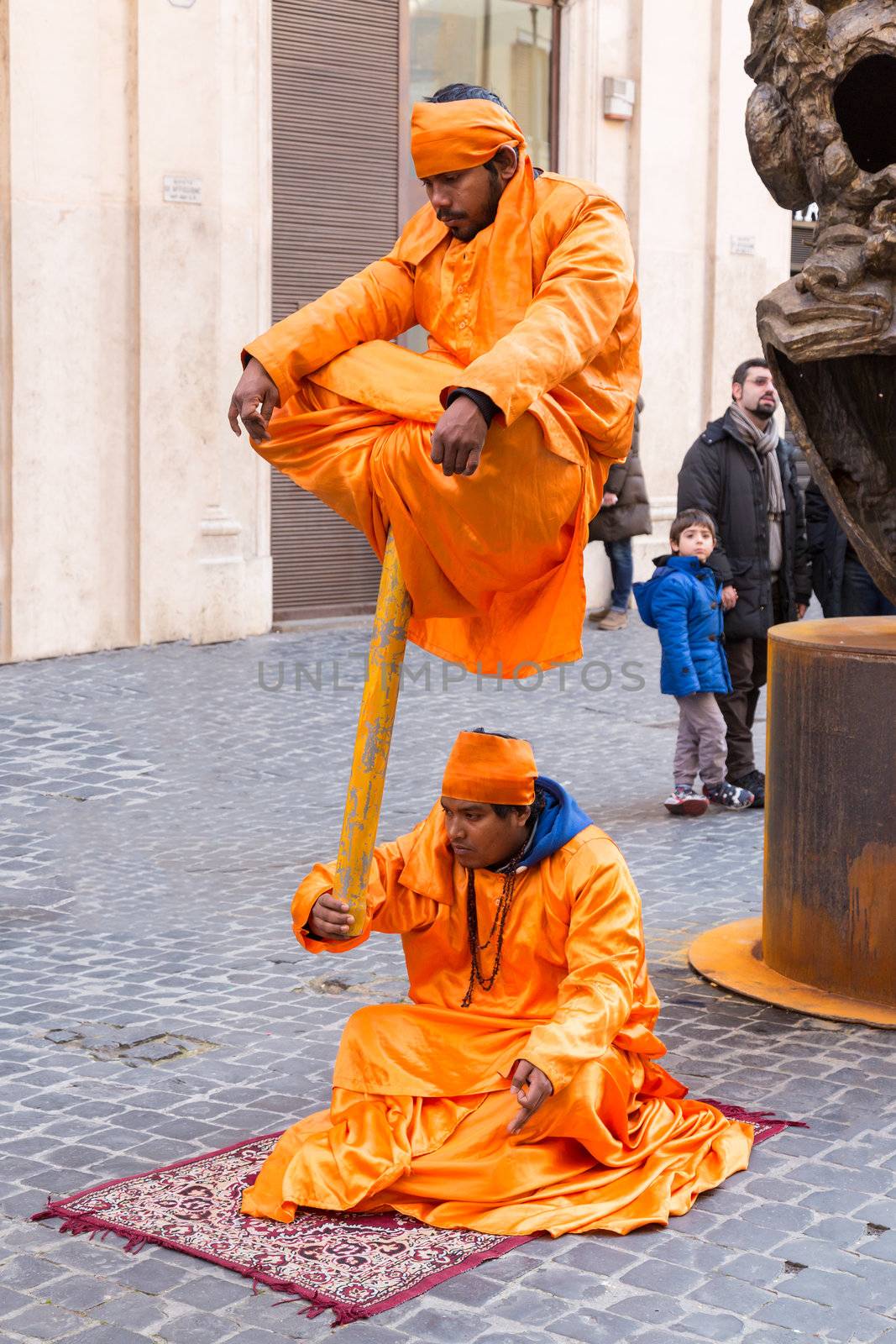 ROME, ITALY - JANUARY 27: Indian Fakirs performing levitation trick in Rome on January 27, 2013.