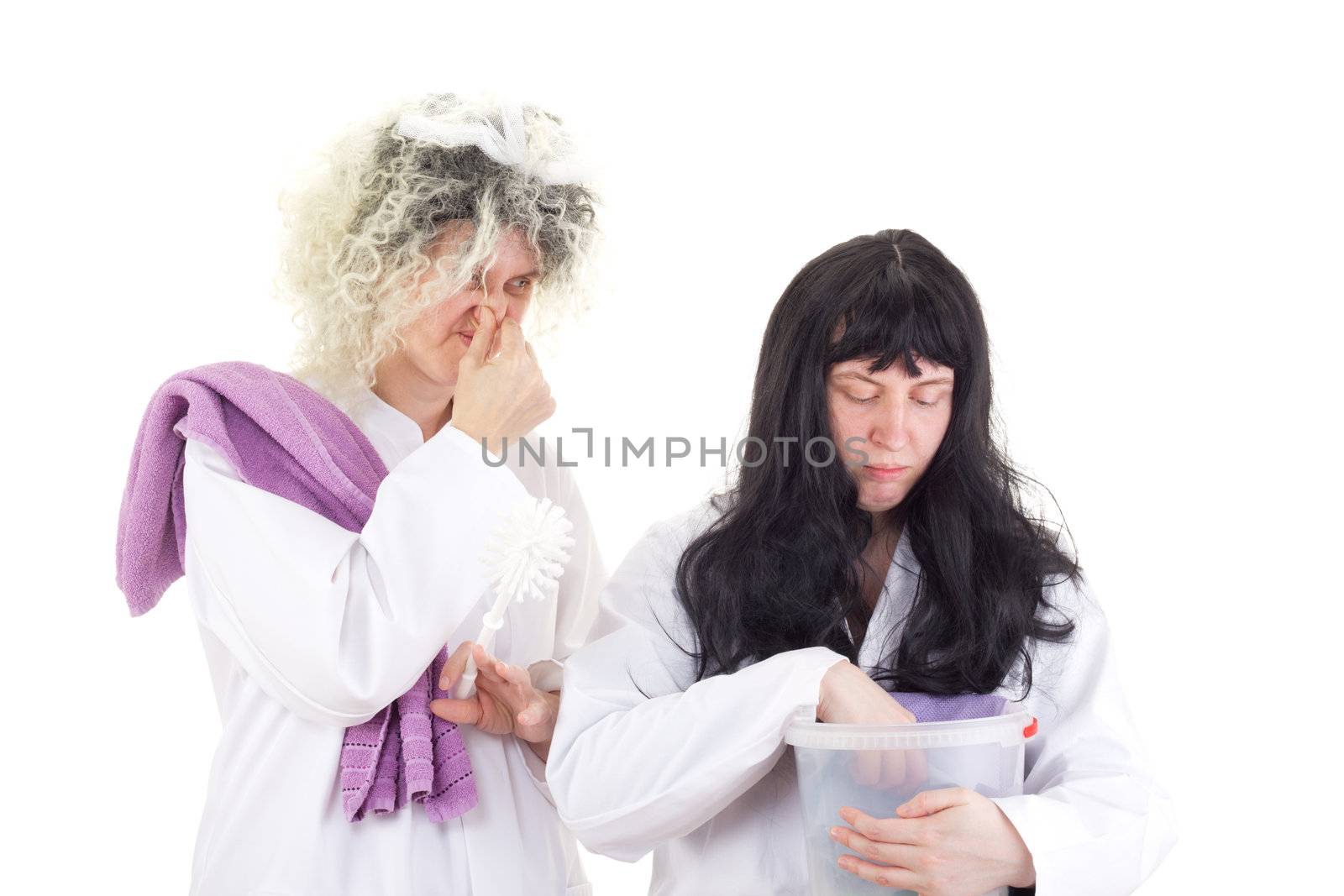 Female cleaners in white work coats