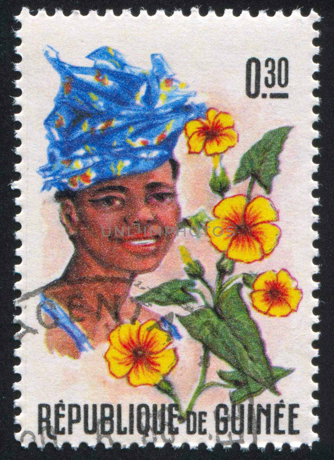 GUINEA CIRCA 1966: stamp printed by Guinea, shows Women and Flowers of Guinea, circa 1966