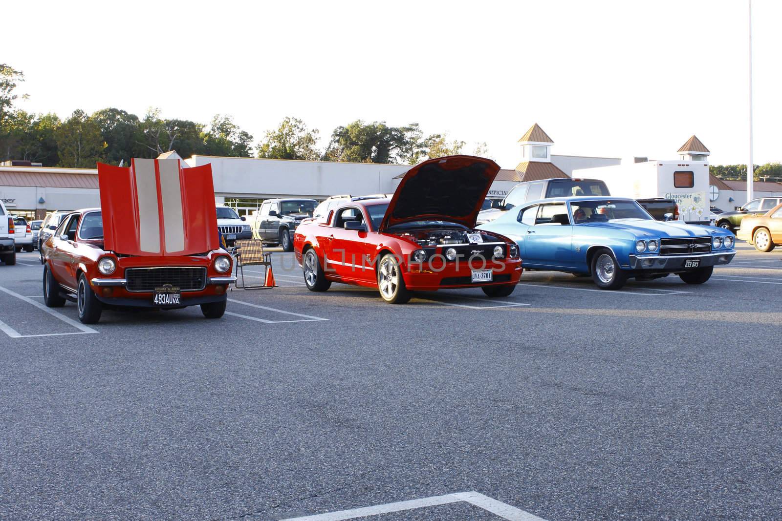 GLOUCESTER, VA, USA - OCTOBER 14: A line of classic antique cars the Middle Peninsula Classic Cruisers Club weekly Car Show. Main Street Center. on October 14, 2011 in Gloucester, VA, USA