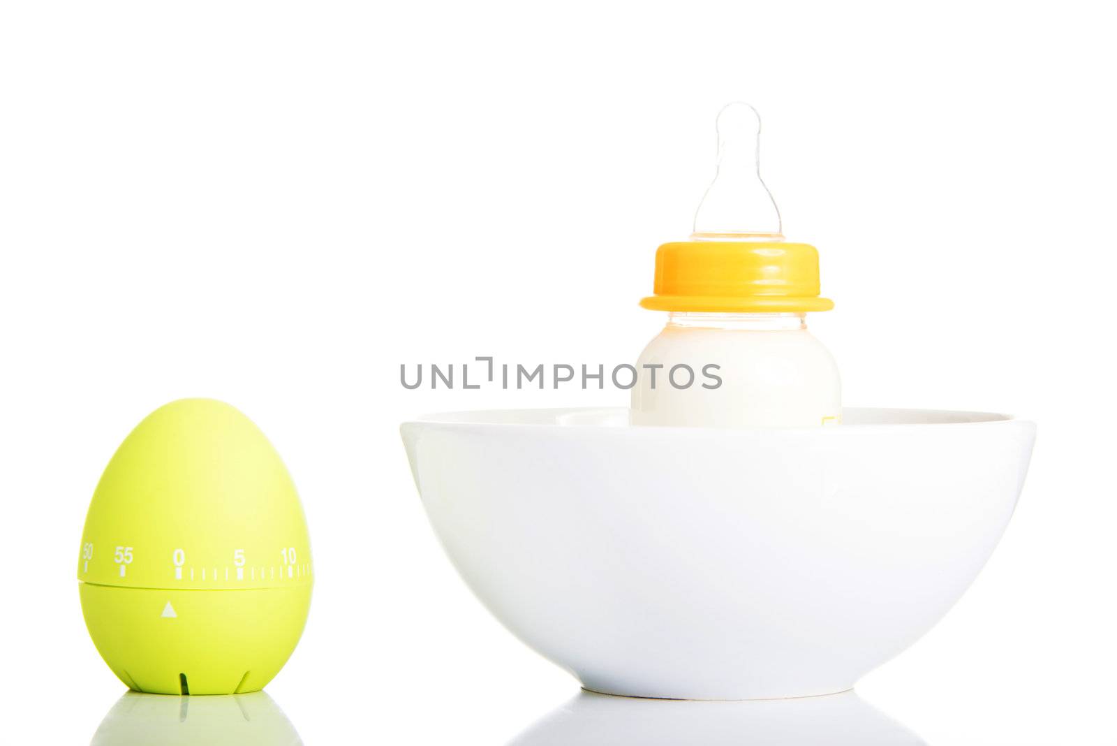 Baby milk bottle and timer close up