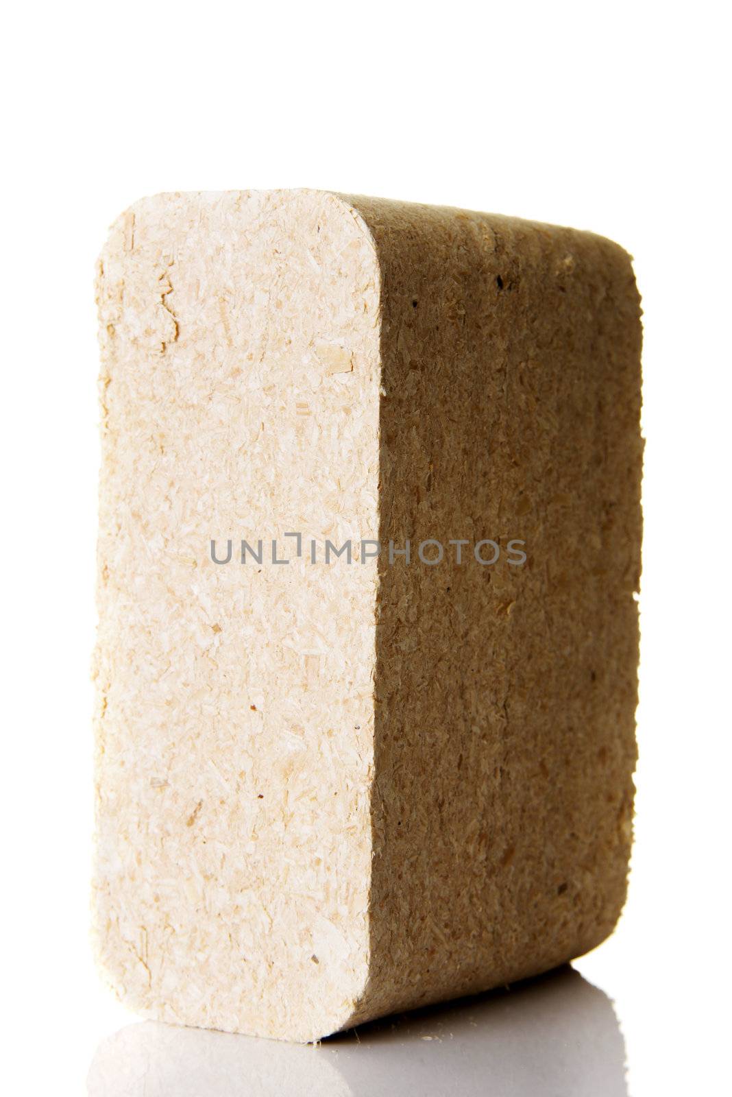 Wood sawdust briquettes , isolated on white