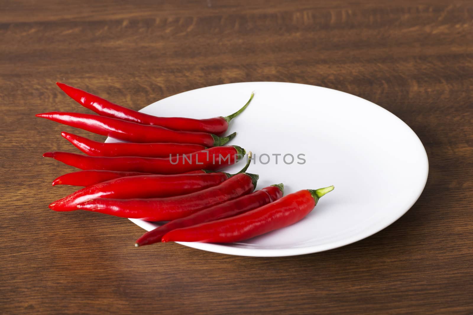 Red hot chilie pepers on plate