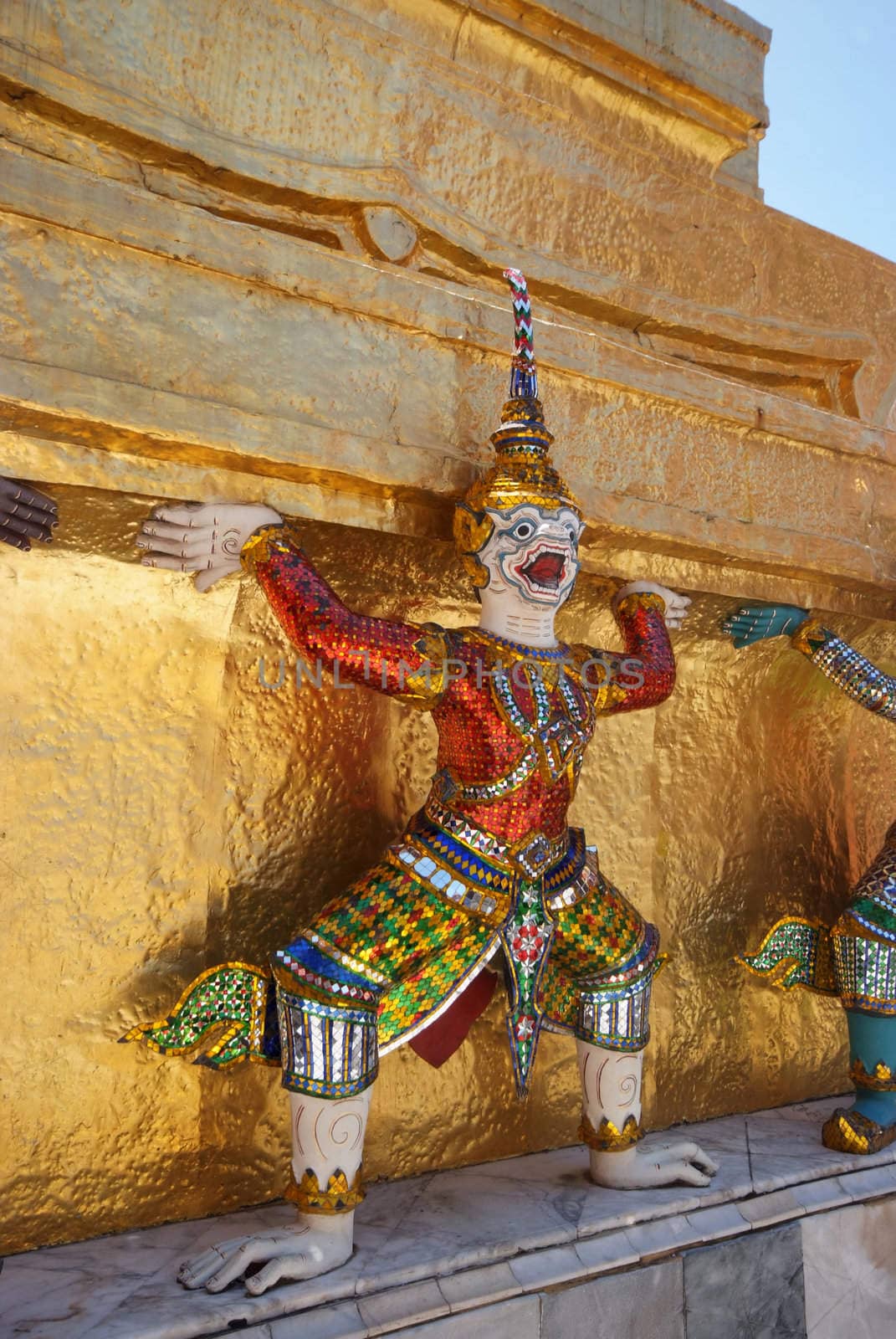 Giant statue of a beautiful Golden Pagoda in Wat Phra Kaew by opasstudio