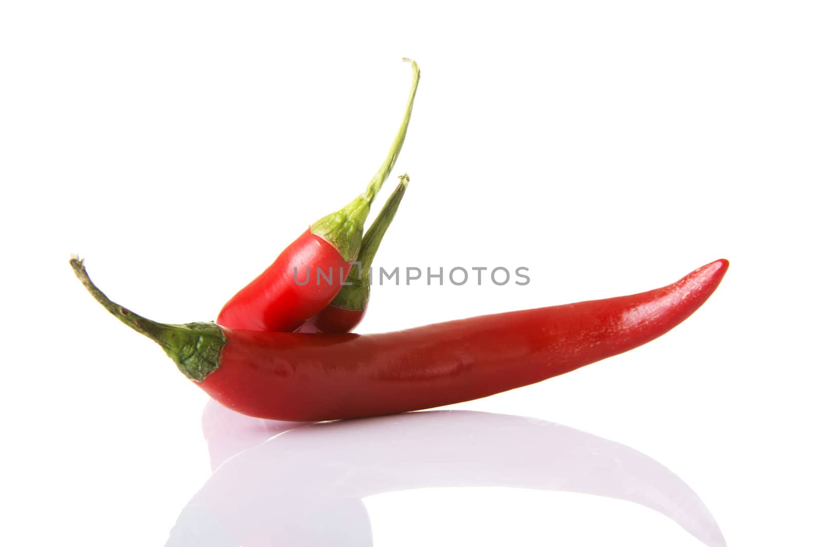 Red hot chilie peppers, isolated on white