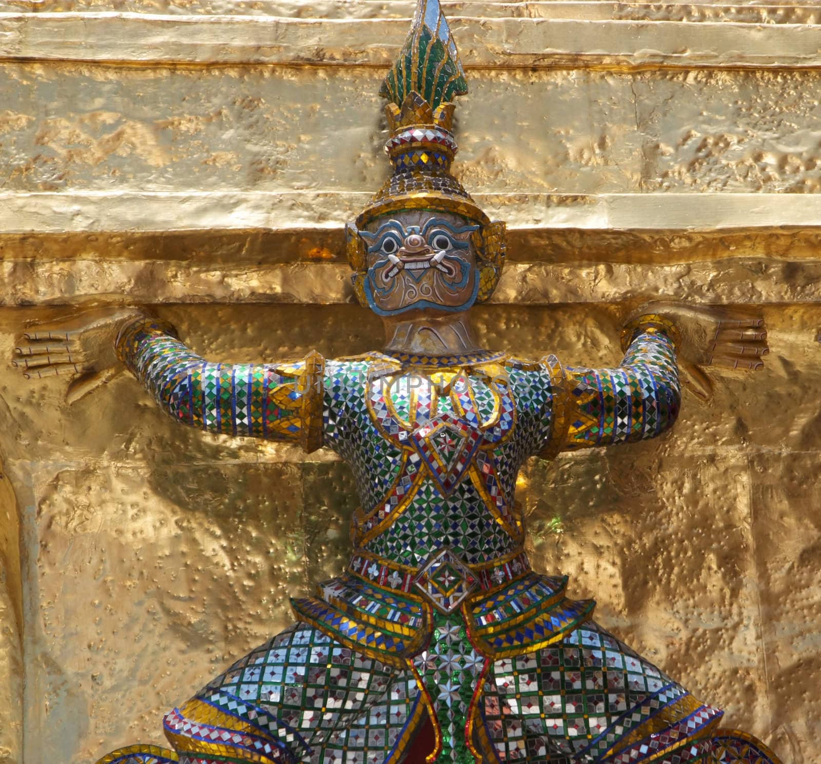 Giant statue of a beautiful Golden Pagoda in Wat Phra Kaew by opasstudio