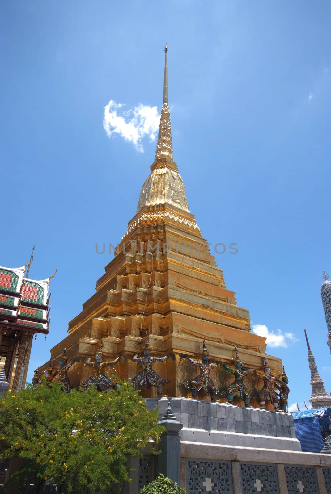 The Golden pagoda of Wat Phra Kaew temple by opasstudio