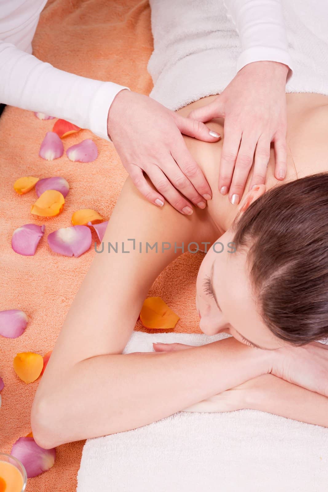 young attractive smilig woman doing wellness spa relaxing massage